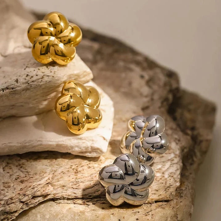 Elegant 18k gold plated stainless steel flower shaped stud earrings with a timeless design