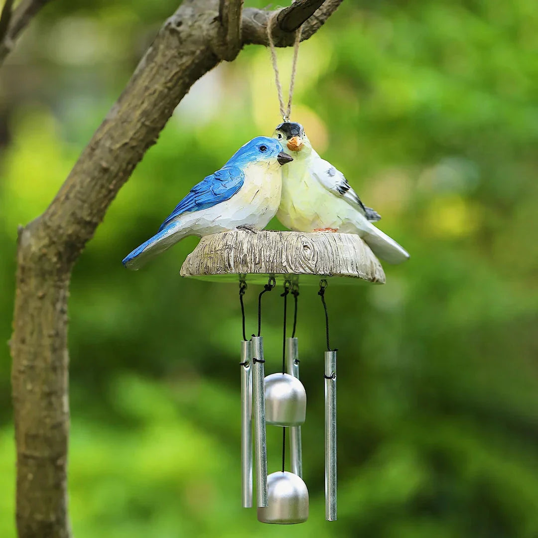 Charming resin birds wind chime for indoor and outdoor decor, featuring a beautiful array of birds that sway gracefully in the breeze.