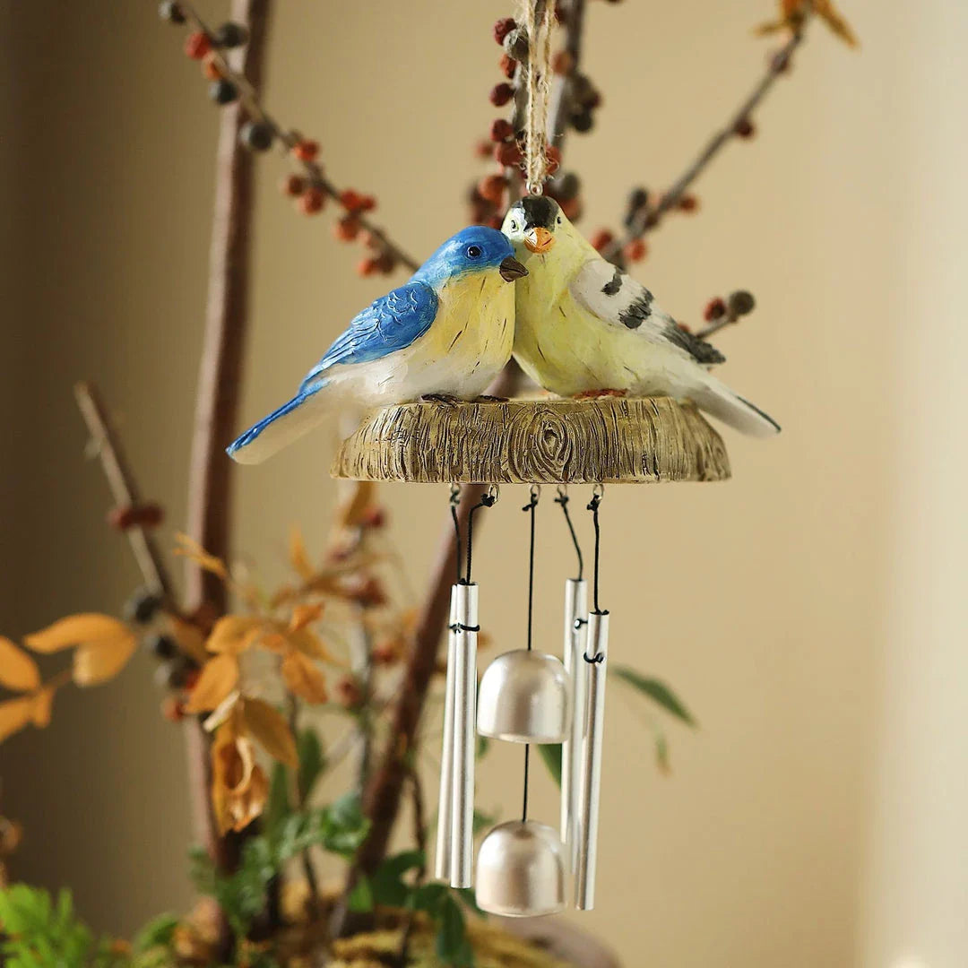 Charming resin birds wind chime for indoor and outdoor decor, featuring a beautiful array of birds that sway gracefully in the breeze.