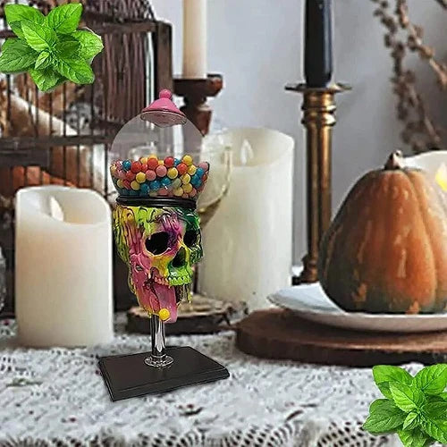 Spooky skull-shaped candy dispenser with transparent brain-shaped compartment and candy on the tongue, perfect for Halloween decor
