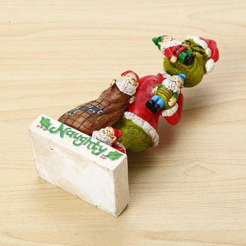 Festive outdoor decoration featuring the Grinch and a group of whimsical garden gnomes, made from durable resin with a vibrant hand-painted finish.