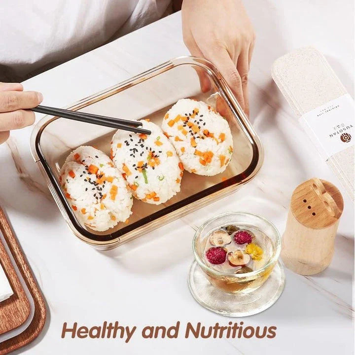 A wooden lunch box with a glass bowl, perfect for kids to bring their meals to school