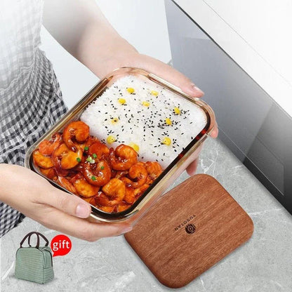 A wooden lunch box with a glass bowl, perfect for kids to bring their meals to school