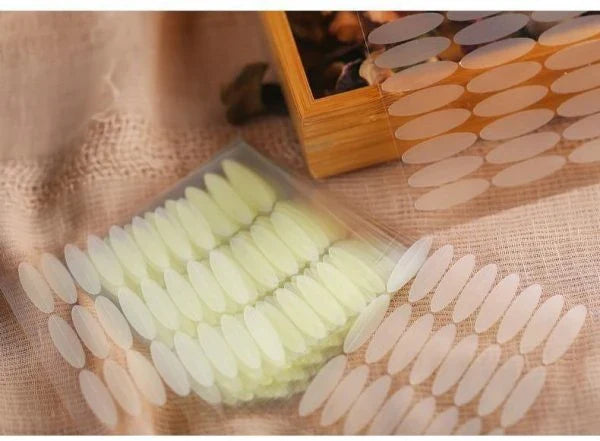 Anti-Aging Eyelid Tape with 120 pairs of transparent, hypoallergenic strips for an instant eye lift