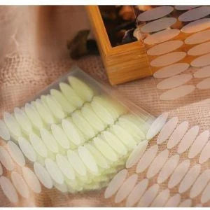 Anti-Aging Eyelid Tape with 120 pairs of transparent, hypoallergenic strips for an instant eye lift