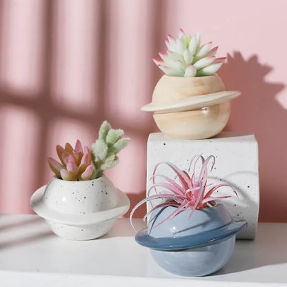 Mini planet-shaped ceramic succulent flower pot in blue color, ideal for indoor and outdoor use