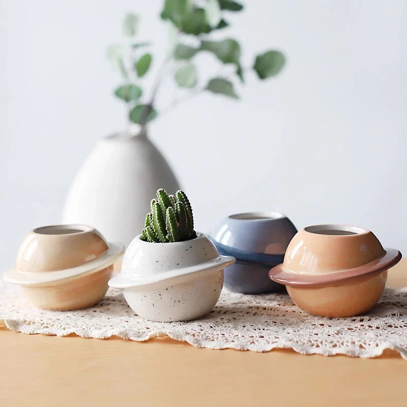 Mini planet-shaped ceramic succulent flower pot in blue color, ideal for indoor and outdoor use