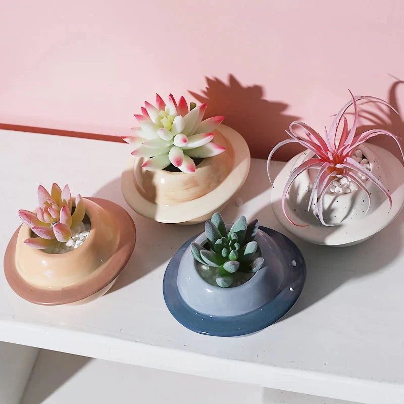 Mini planet-shaped ceramic succulent flower pot in blue color, ideal for indoor and outdoor use