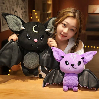 Soft and cuddly bat plush toy in purple and black colors, perfect for home decor and gift-giving