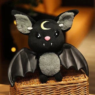 Soft and cuddly bat plush toy in purple and black colors, perfect for home decor and gift-giving