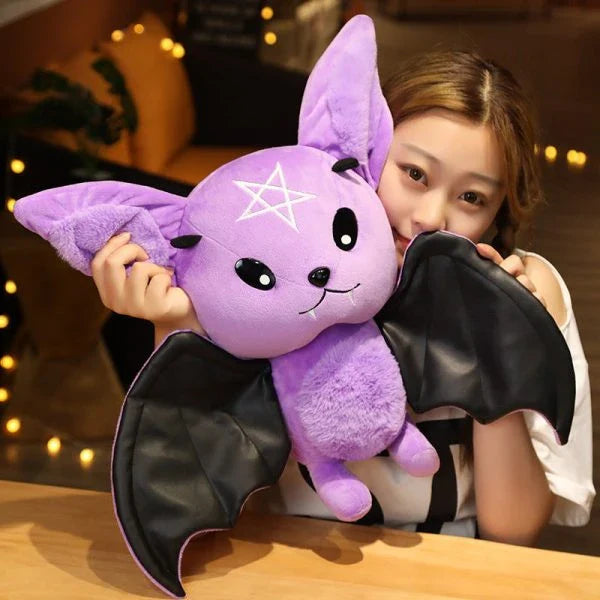 Soft and cuddly bat plush toy in purple and black colors, perfect for home decor and gift-giving