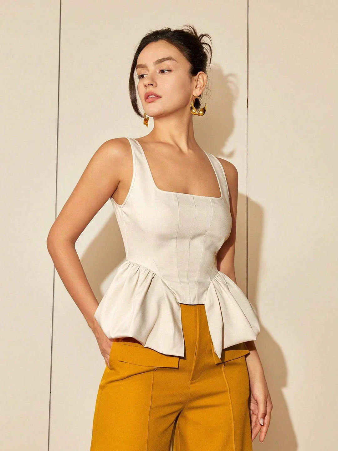 Chic square neck asymmetrical hem top in beige color, featuring a structured fit and premium polyester blend fabric for elevated style and comfort.