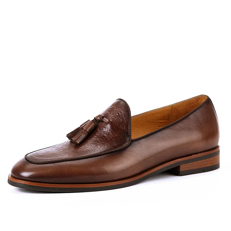 Premium British-inspired men's business casual loafers made from top-grain cowhide leather with a classic tassel design and shock-absorbing sole