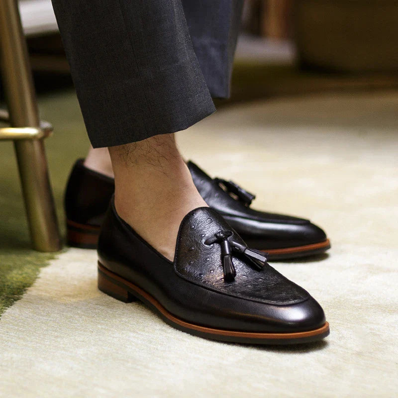 Premium British-inspired men's business casual loafers made from top-grain cowhide leather with a classic tassel design and shock-absorbing sole