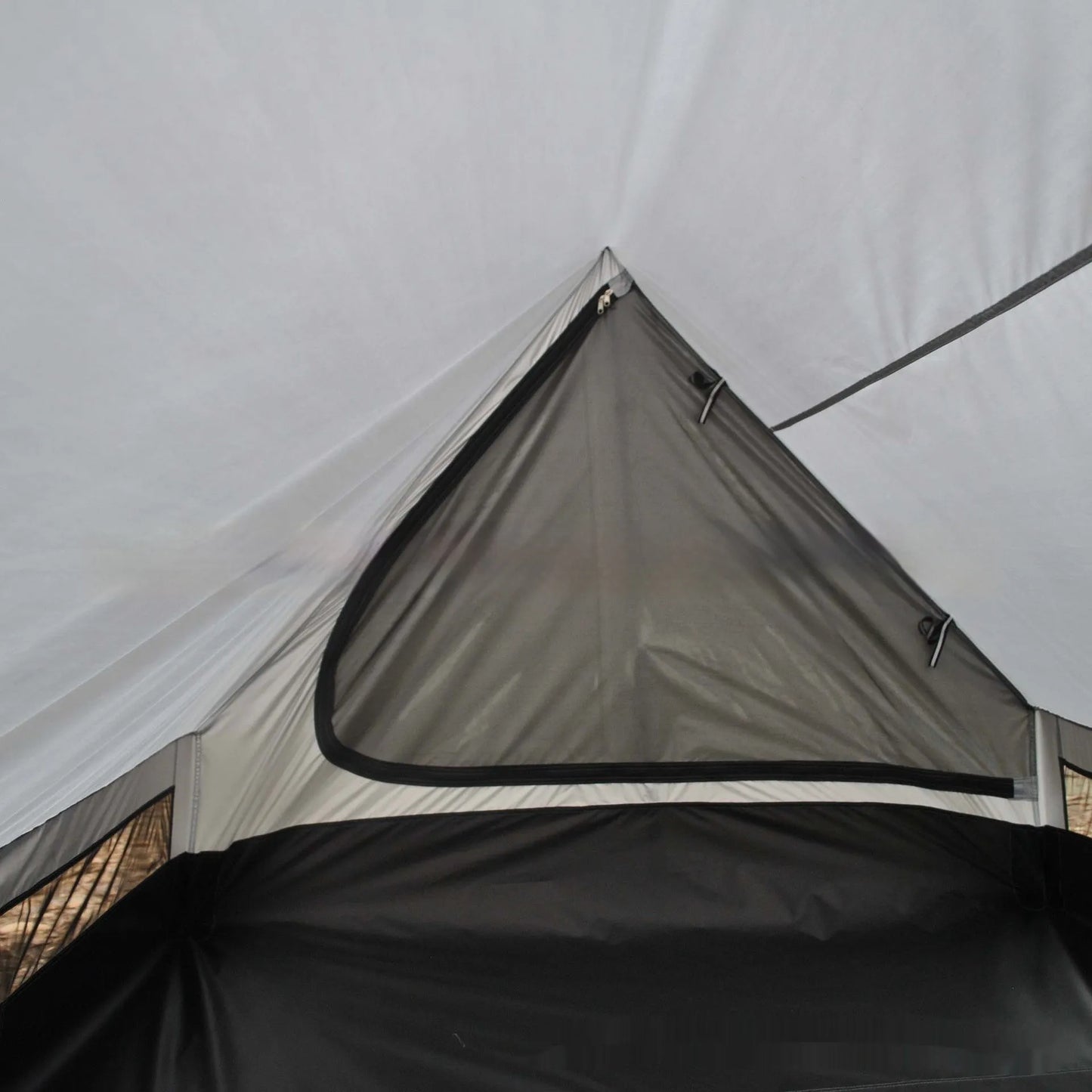 Brown and white portable A-line camping tent set up with hiking poles, showing its spacious interior for 2-3 people.