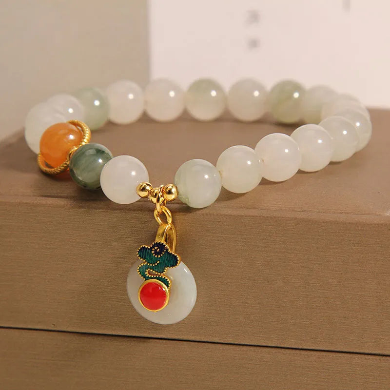 Ice jade crystal bracelet for women with Xiangyun peace jade buckle and pearl accents.
