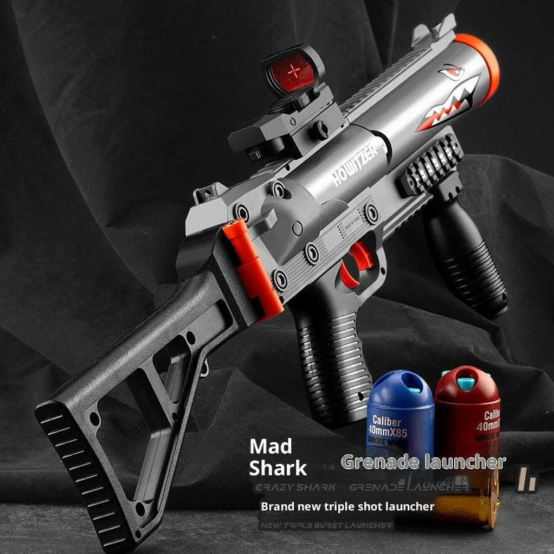 Three-series grenade launcher soft bullet gun in shark sand colour, showing 25cm length and textured grip surface