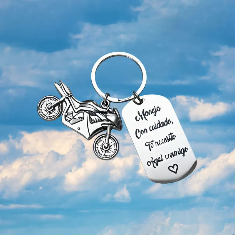 Stainless steel minimalist motorcycle keychain in a flannel gift bag.