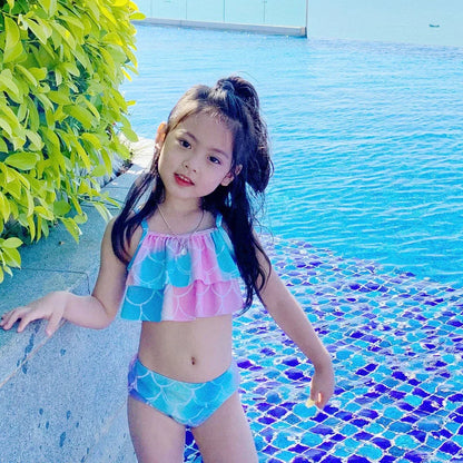 Children's swimsuit set with bikini top and fish tail skirt in pink colours