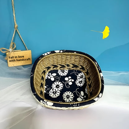 Blue square plastic hand-woven storage basket on a tabletop.