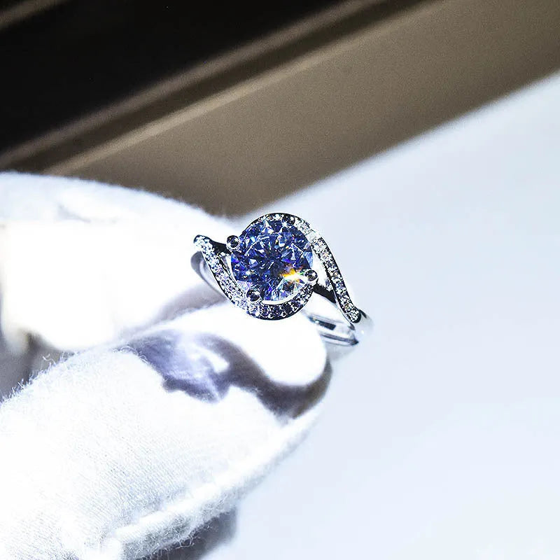 Silver adjustable women's ring with synthetic moissanite angel eyes design and geometric texture