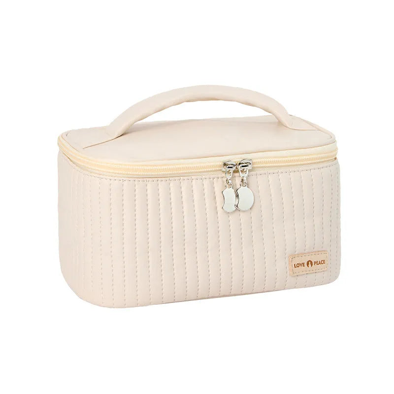 Open-top cake makeup bag in six colour options with PU leather construction and 20cm dimensions