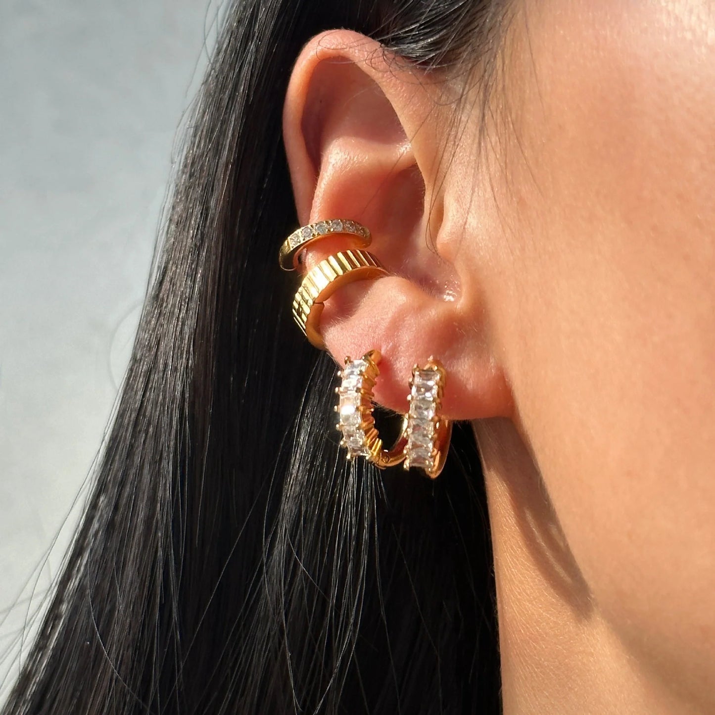 Retro titanium steel small zircon earrings with flower design in gold