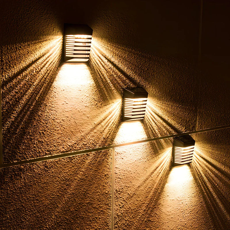 Solar-powered decorative wall lamp with 20 lumen output and IP54 waterproof rating for garden and outdoor lighting, featuring automatic dusk-to-dawn operation with 6-12 hour runtime from polycrystalline silicon solar panel charging