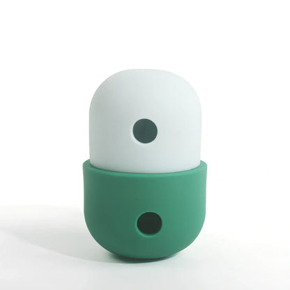 Yellow and blue silicone dog toy ball with treat opening for medium to large breed dogs