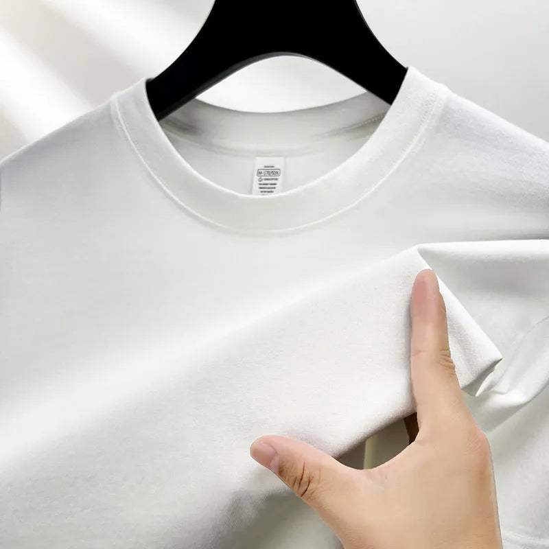 Men's drop shoulder t-shirt in thin cotton fabric, shown in a solid colour.