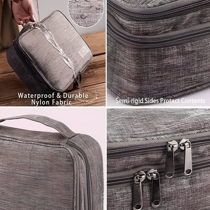 Gray waterproof electronics organiser bag open showing double-layer compartments with elastic loops and mesh pouches