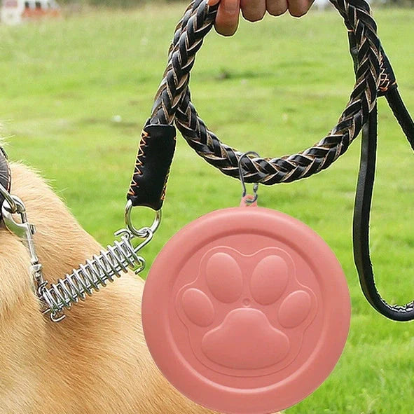 Collapsible dog food bowl showing expanded and folded positions with leak-proof silicone base