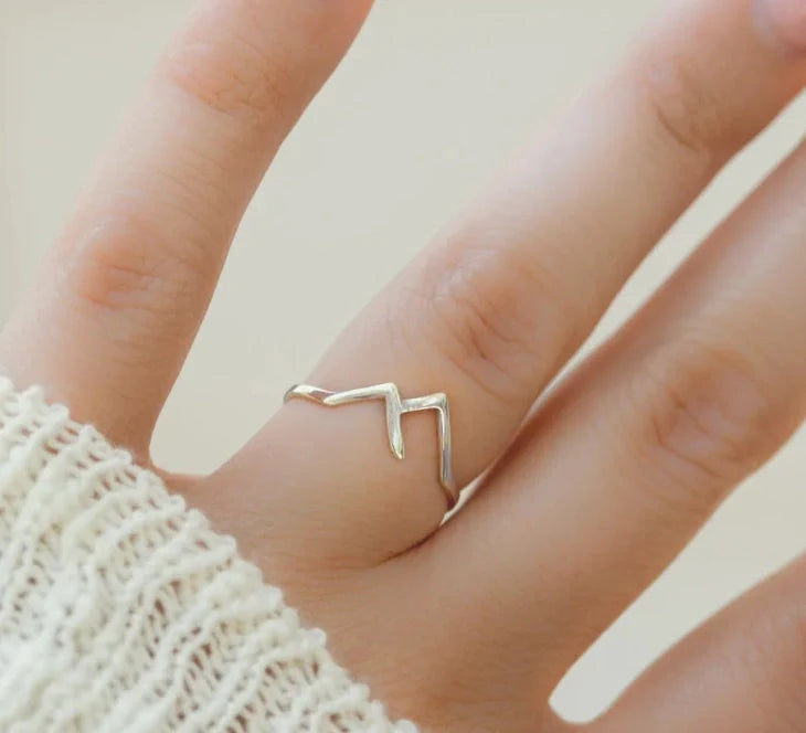 Handcrafted mountain-shaped copper ring with unique design and antibacterial properties