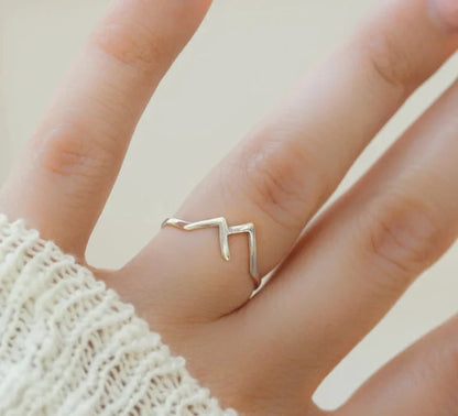 Handcrafted mountain-shaped copper ring with unique design and antibacterial properties