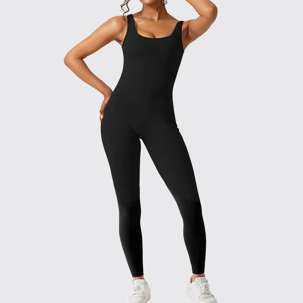 Women's sleeveless flare jumpsuit for yoga in high elasticity polyester fabric.