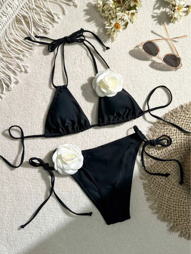 Black women's bikini set with 3D flower lace detailing and an adjustable drawstring waist.