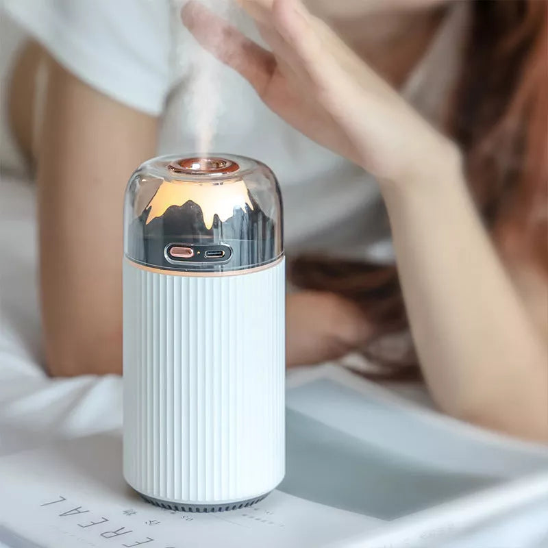 Volcano Pumping Humidifier for Car Aromatherapy in white, light blue, or gray