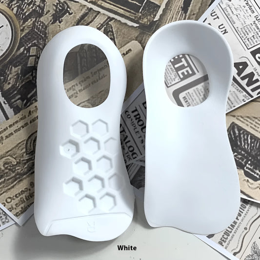 Pair of TPR varus correction arch support insoles in black, white, and skin colour options.