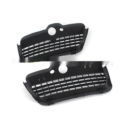 Pair of black ABS plastic Volkswagen Golf 3 fog lamp covers for front bumper.