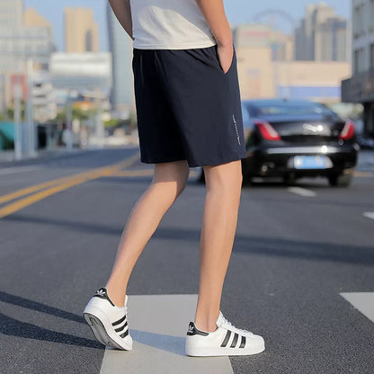 Men's Five-point Sports Shorts in quick-drying cotton, available in gray, black, and blue