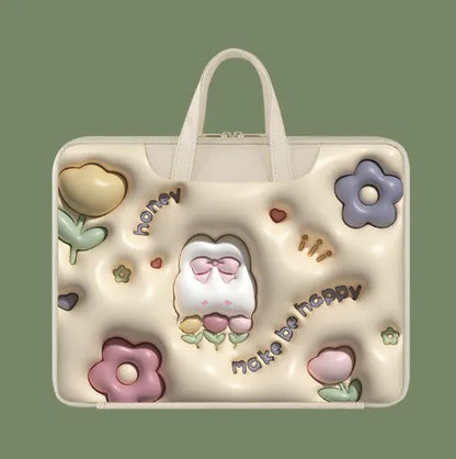 PU leather inflatable laptop bag with strap, shown in a cartoon pattern design, hanging from a suitcase handle.