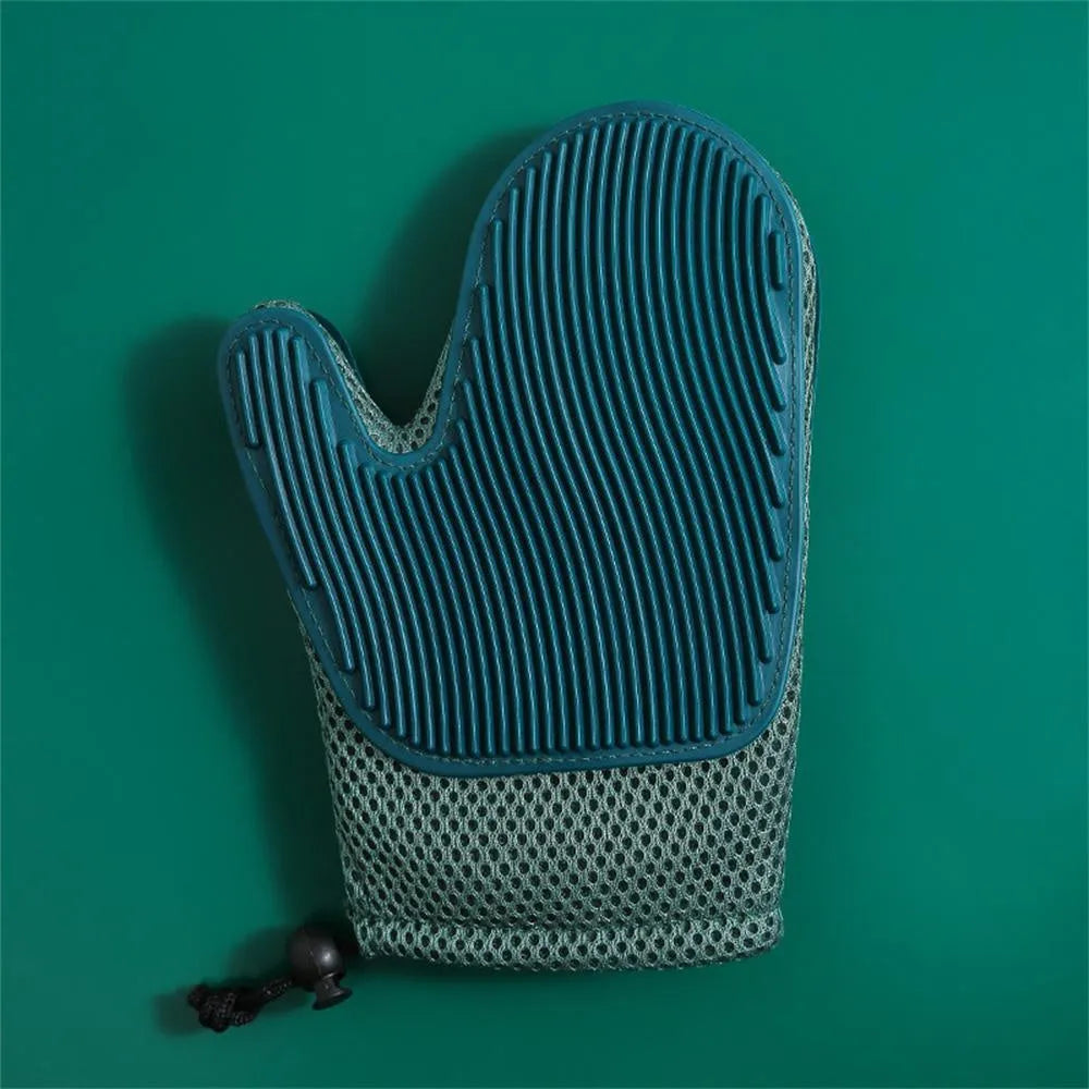 Dark blue pet grooming glove with textured TPR rubber nubs for removing hair from dogs, cats, and furniture.