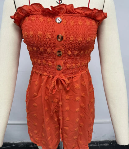 Women's off-shoulder sleeveless jumpsuit in polyester fabric with button detailing and mid-waist design