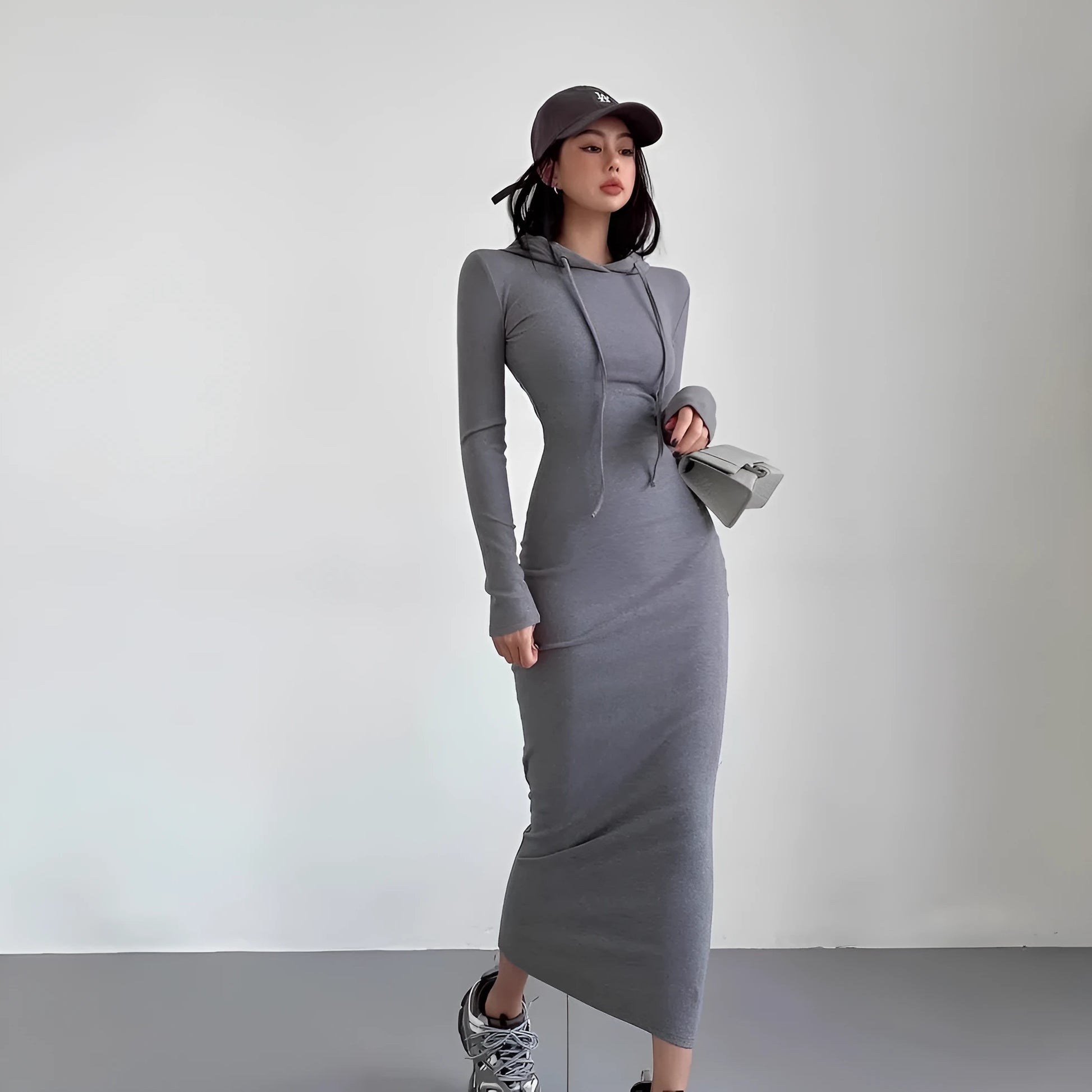 Women's sheath over-the-knee dress with hood and long sleeves in polyester, available in multiple colours