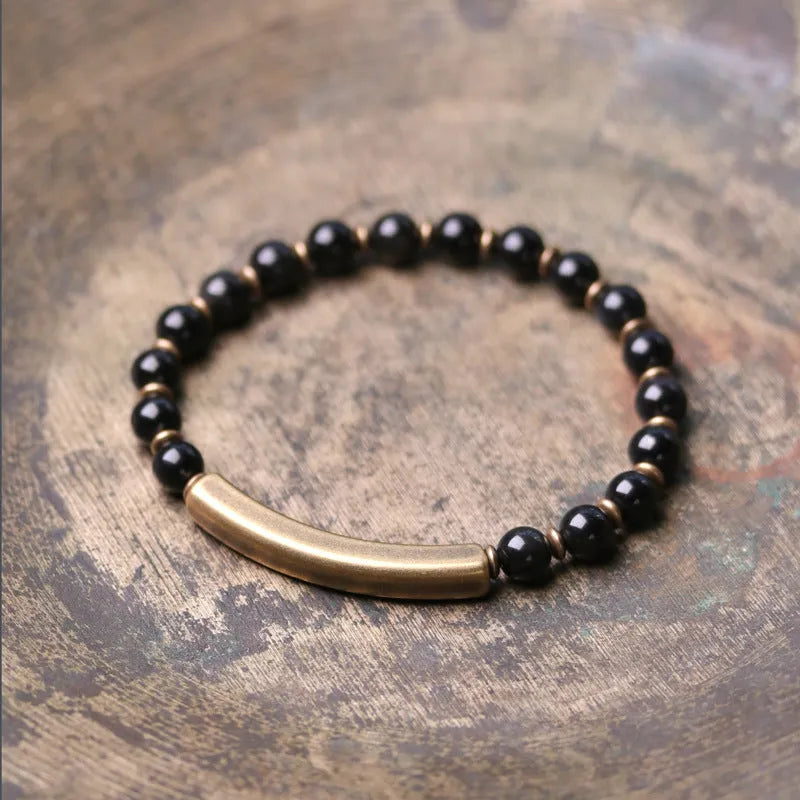 Layered retro ethnic bracelet for men and women with stone beads and brass spacers.