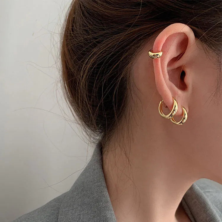 Women's retro minimalist water drop earrings in geometric round shape available in gold or silver colour with three size options