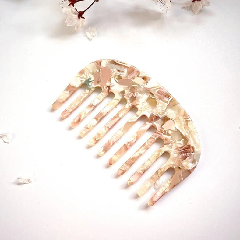 Retro acetate hair comb in cherry blossom powder colour showing 10x6.2cm dimensions and rounded teeth