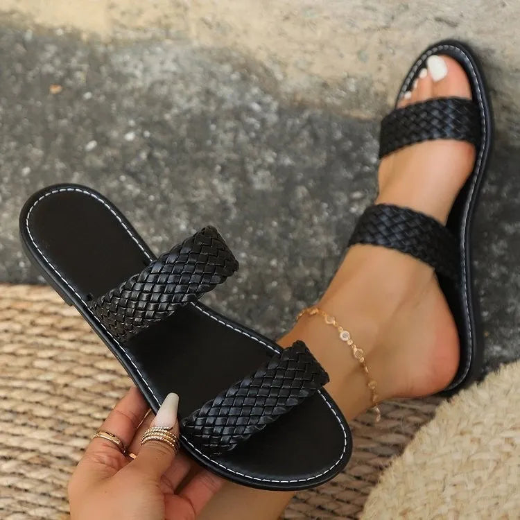 Plus size women's woven beach slipper in synthetic leather, available in multiple colours.