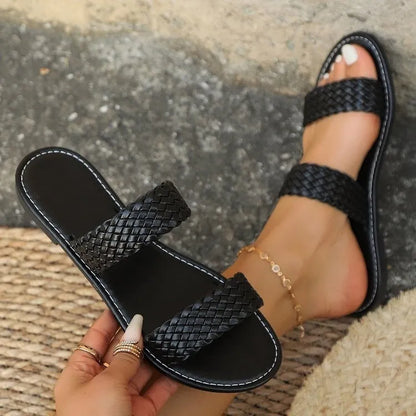 Plus size women's woven beach slipper in synthetic leather, available in multiple colours.