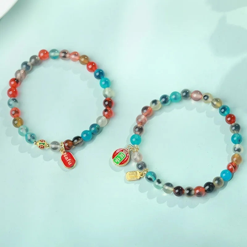 Women's natural agate bracelet with copper coin snake elements in geometric design